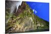 A Tall Waterfall Drops Off a Steep Cliff into Waters, Milford Sound on South Island, New Zealand-Paul Dymond-Stretched Canvas