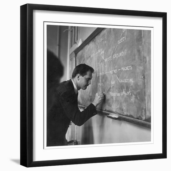 A Teacher Writing on a Blackboard at Northfield House Junior School, Leicester-Henry Grant-Framed Photographic Print