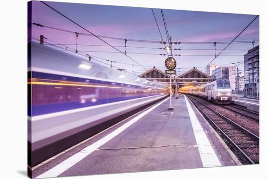 A TGV high speed train leaves the train station in Tours, Indre et Loire, Centre, France, Europe-Julian Elliott-Stretched Canvas