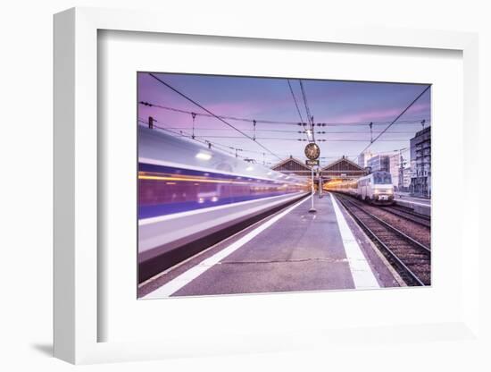 A TGV high speed train leaves the train station in Tours, Indre et Loire, Centre, France, Europe-Julian Elliott-Framed Photographic Print