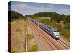 A Tgv Train Speeds Through the French Countryside Near to Tours, Indre-Et-Loire, Centre, France, Eu-Julian Elliott-Stretched Canvas