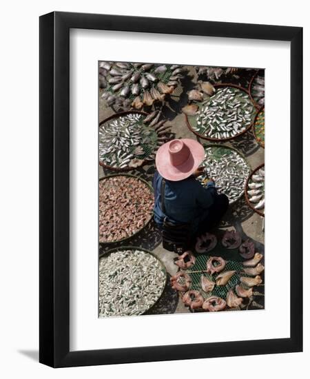 A Thai Woman Sells Dried Fish in Bangkok, Thailand, January 26, 2007-Apichart Weerawong-Framed Premium Photographic Print