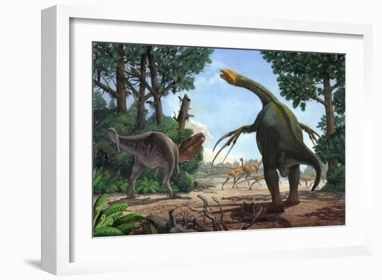 A Therizinosaurus Prevents a Young Tarbosaurus in His Hunt for Gallimimus-null-Framed Art Print