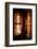 A Tibetan woman stands next to a large prayer wheel of the temple of Boudhanath Stupa, Kathmandu, N-Julian Bound-Framed Photographic Print