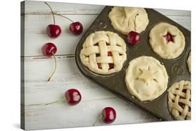 A Tin Filled with Small Fresh Cherry Pies Ready to Go into the Oven-Cynthia Classen-Stretched Canvas