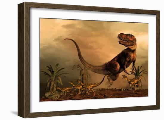 A Torvosaurus on the Prowl While a Group of Ornitholestes Flee a Hasty Retreat-null-Framed Art Print