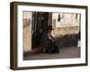 A Traditional Bolivian Woman Sits on a Doorstep in Potosi at Sunset-Alex Saberi-Framed Premium Photographic Print