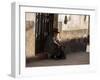 A Traditional Bolivian Woman Sits on a Doorstep in Potosi at Sunset-Alex Saberi-Framed Premium Photographic Print