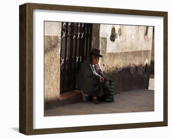 A Traditional Bolivian Woman Sits on a Doorstep in Potosi at Sunset-Alex Saberi-Framed Photographic Print