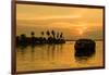 A traditional houseboat moves past the setting sun on the Kerala Backwaters, Kerala, India, Asia-Logan Brown-Framed Photographic Print