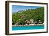 A traditional Thai resort overlooks turquoise water on the tropical island of Koh Tao, Thailand-Logan Brown-Framed Photographic Print