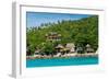 A traditional Thai resort overlooks turquoise water on the tropical island of Koh Tao, Thailand-Logan Brown-Framed Photographic Print