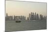 A Traditional Wooden Dhow Boat Sails Past Modern Skyscrapers, West Bay Financial District, Doha-Stuart Forster-Mounted Photographic Print