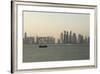 A Traditional Wooden Dhow Boat Sails Past Modern Skyscrapers, West Bay Financial District, Doha-Stuart Forster-Framed Photographic Print