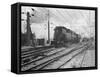 A Train Riding along an Electric Railroad-null-Framed Stretched Canvas