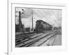 A Train Riding along an Electric Railroad-null-Framed Photographic Print