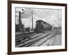 A Train Riding along an Electric Railroad-null-Framed Photographic Print