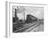 A Train Riding along an Electric Railroad-null-Framed Photographic Print