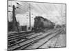 A Train Riding along an Electric Railroad-null-Mounted Photographic Print