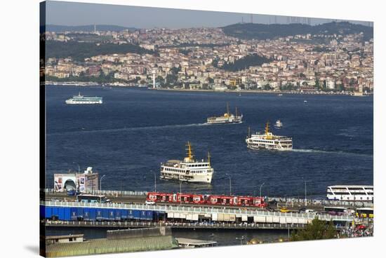 A Tram Crosses Galata Bridge-Jon Hicks-Stretched Canvas