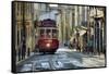 A tramway in Alfama district with the Motherchurch (Se Catedral) in the background. Lisbon, Portuga-Mauricio Abreu-Framed Stretched Canvas