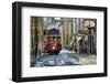 A tramway in Alfama district with the Motherchurch (Se Catedral) in the background. Lisbon, Portuga-Mauricio Abreu-Framed Photographic Print