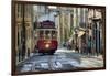 A tramway in Alfama district with the Motherchurch (Se Catedral) in the background. Lisbon, Portuga-Mauricio Abreu-Framed Photographic Print