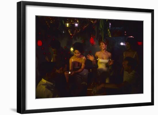 A Trio of Hostesses Attend to a Table of Men at the Albion Jazz Coffee Shop, Tokyo, Japan, 1962-Eliot Elisofon-Framed Photographic Print