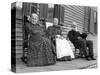 A Trio of Seniors on the Porch Watch the World Go By, Ca. 1900-null-Stretched Canvas