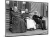 A Trio of Seniors on the Porch Watch the World Go By, Ca. 1900-null-Mounted Photographic Print