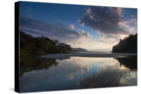 A Tropical Scene with the Itamambuca River Entering the Atlantic Ocean at Itamambuca Beach-Alex Saberi-Stretched Canvas