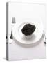 A Truffle on a White Plate-null-Stretched Canvas