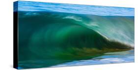 A tubing wave off a Hawaiian beach-Mark A Johnson-Stretched Canvas