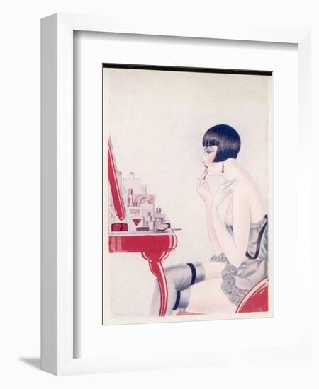 A Twenties Girl at Her Dressing Table Adds a Final Touch of Lipstick-null-Framed Art Print