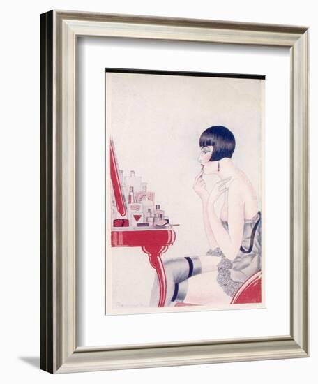 A Twenties Girl at Her Dressing Table Adds a Final Touch of Lipstick-null-Framed Art Print