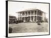 A Two-Story House Surrounded by Porches, with an American Flag Flying; in Panama During the…-Byron Company-Stretched Canvas