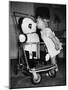 A Two Year Old Girl Kisses a Stuffed Panda on the Nose, Ca. 1955-null-Mounted Photographic Print