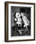 A Two Year Old Girl Kisses a Stuffed Panda on the Nose, Ca. 1955-null-Framed Photographic Print