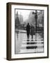A Typical English Street on a Rainy Shopping Day: an Elderly Couple Use the Zebra Crossing-Henry Grant-Framed Photographic Print