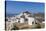 A Typical Greek Village Perched on a Rock with White and Blue Houses and Quaint Windmills, Ios-Roberto Moiola-Stretched Canvas