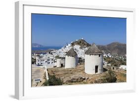 A Typical Greek Village Perched on a Rock with White and Blue Houses and Quaint Windmills, Ios-Roberto Moiola-Framed Photographic Print