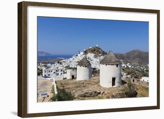 A Typical Greek Village Perched on a Rock with White and Blue Houses and Quaint Windmills, Ios-Roberto Moiola-Framed Photographic Print