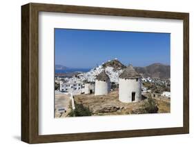 A Typical Greek Village Perched on a Rock with White and Blue Houses and Quaint Windmills, Ios-Roberto Moiola-Framed Photographic Print