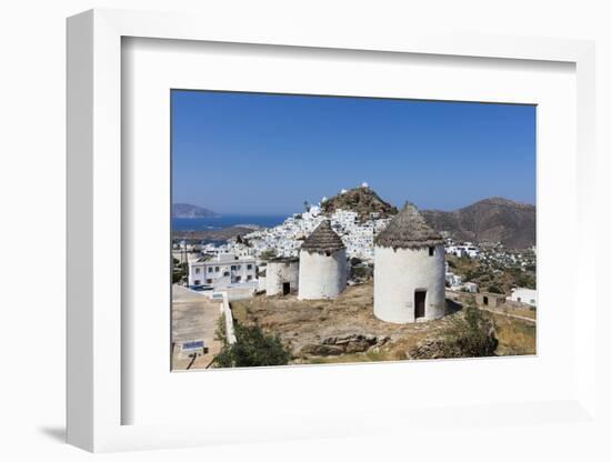 A Typical Greek Village Perched on a Rock with White and Blue Houses and Quaint Windmills, Ios-Roberto Moiola-Framed Photographic Print