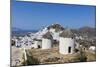 A Typical Greek Village Perched on a Rock with White and Blue Houses and Quaint Windmills, Ios-Roberto Moiola-Mounted Photographic Print