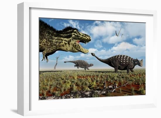 A Tyrannosaurus Rex Hunting Down a Pair of Ankylosaurus Dinosaurs-null-Framed Art Print