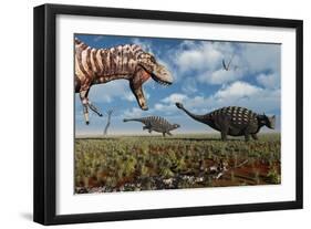 A Tyrannosaurus Rex Hunting Down a Pair of Ankylosaurus Dinosaurs-null-Framed Art Print
