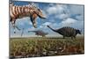 A Tyrannosaurus Rex Hunting Down a Pair of Ankylosaurus Dinosaurs-null-Mounted Art Print