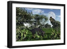 A Tyrannosaurus Rex Stalking a Herbivorous Ankylosaurus-null-Framed Art Print