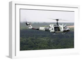 A U.S. Air Force Uh-1H Huey in an Experiment Paint Scheme-null-Framed Photographic Print